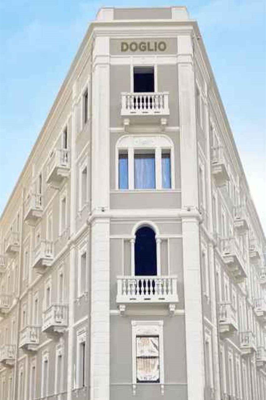 Palazzo Doglio Hotell Cagliari Eksteriør bilde The facade of the building