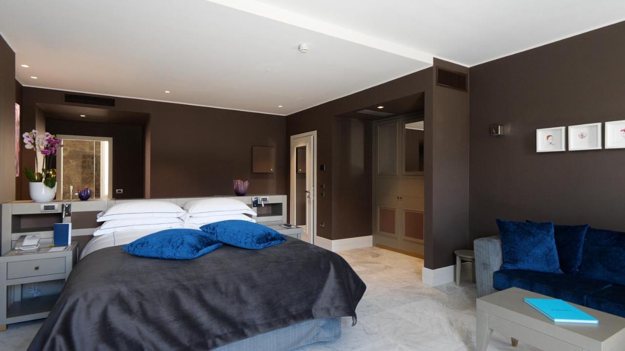 Palazzo Doglio Hotell Cagliari Eksteriør bilde A bedroom at the hotel